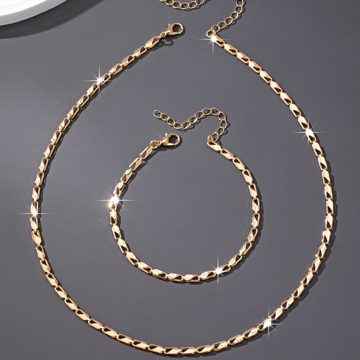 Elegant 18k Gold Necklace and Bracelet Set