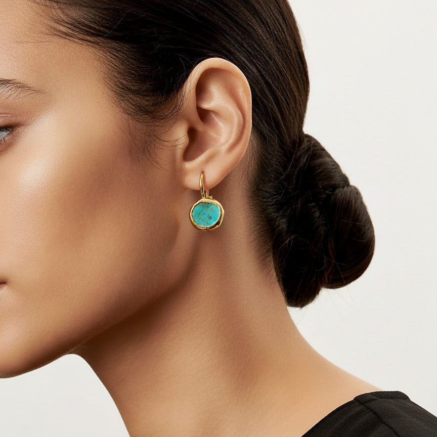 Gold earrings with turquoise stone