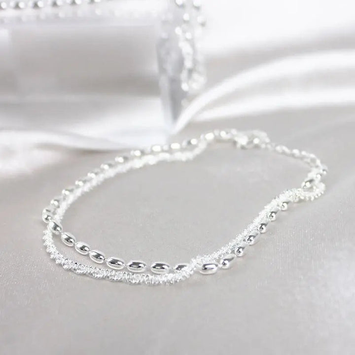 Elegant Silver Bracelet Set with Zirconium Stones