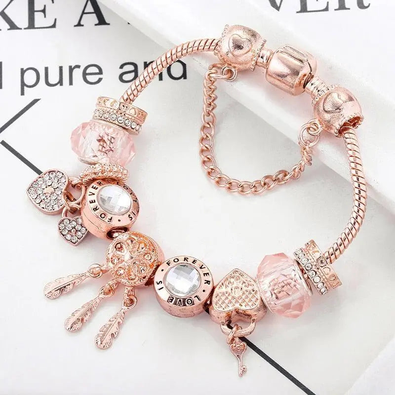 Roze Dromenvanger Armband met Inclusief Zilveren Charms