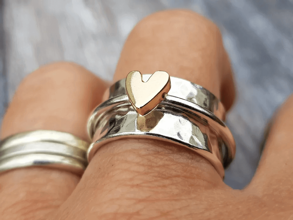 Zilveren ring met gouden hart