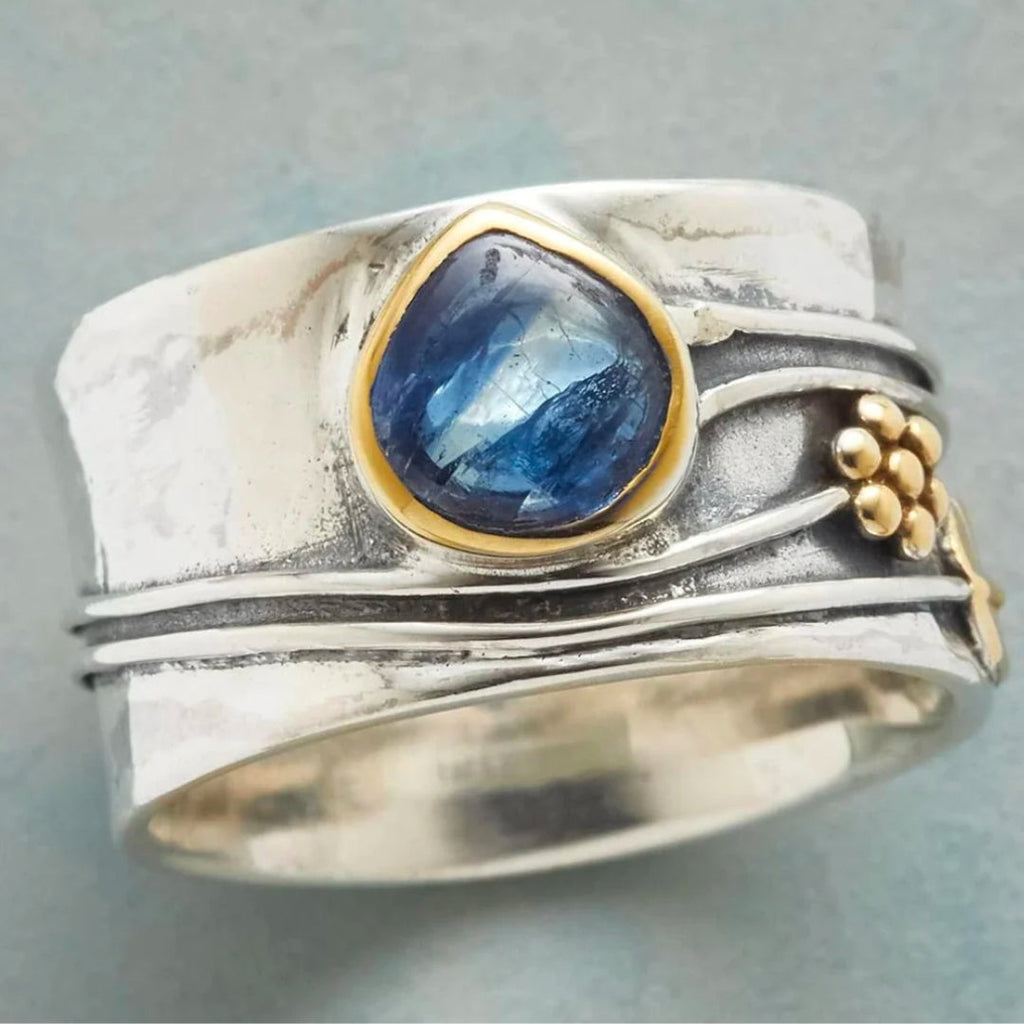 Vintage zilveren ring met blauwe kristal