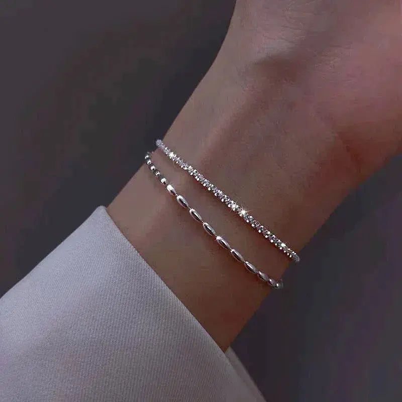 Elegant silver bracelet set with zirconia stones