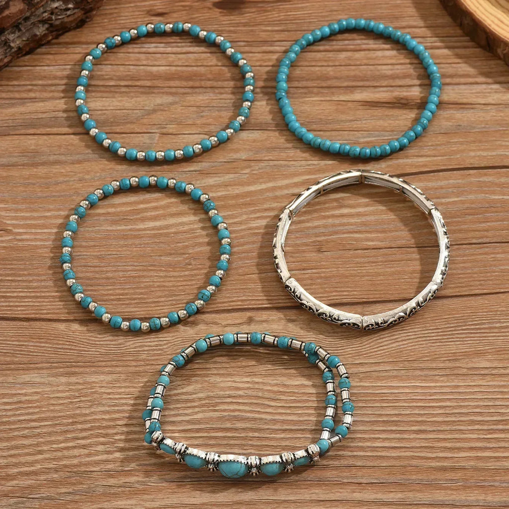 Armbandenset met turquoise kralen