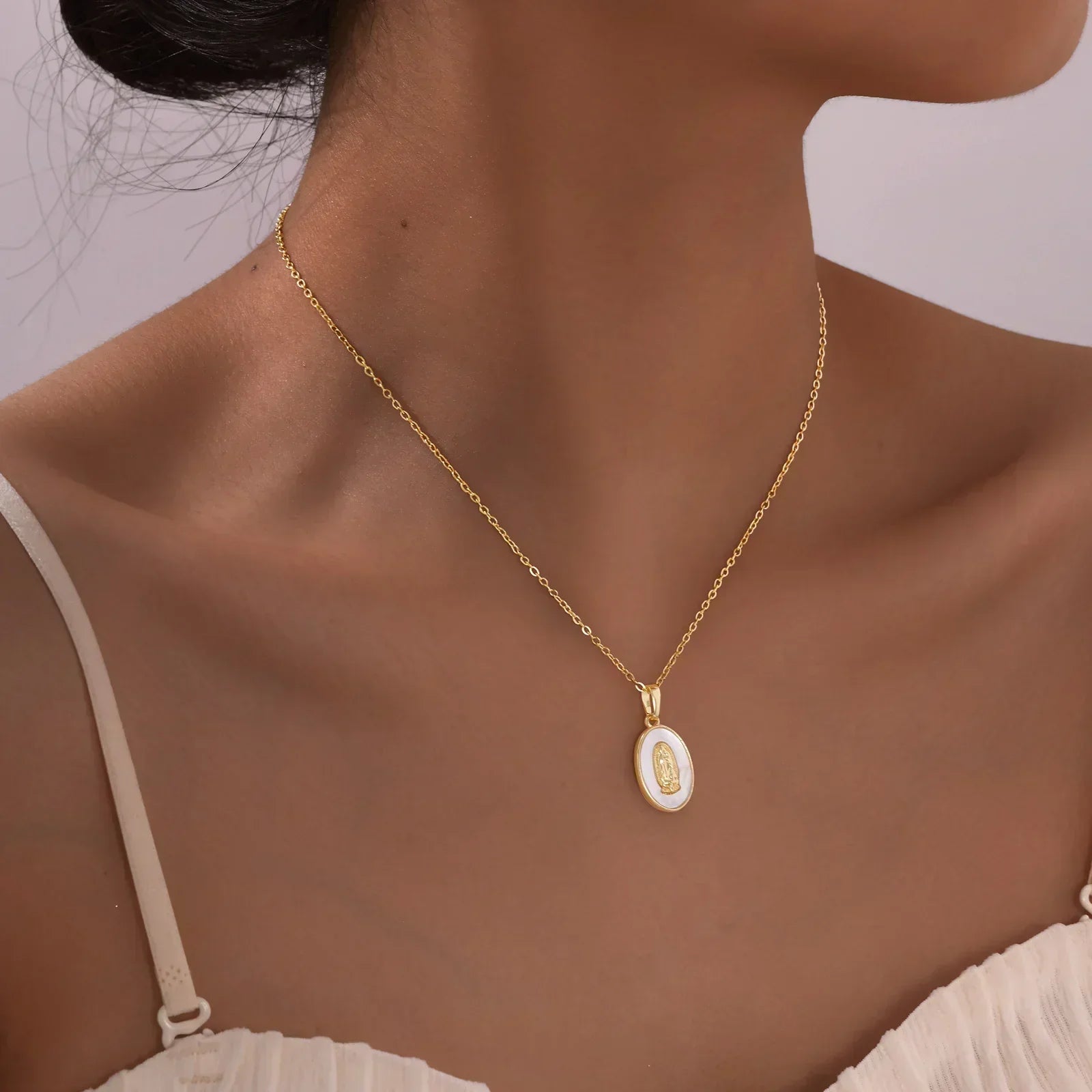 Necklace with Oval Virgin Mary Pendant in Gold
