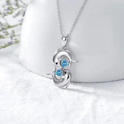 Zilveren Collier met Dubbele Dolfijnen en Blauwe Kristal