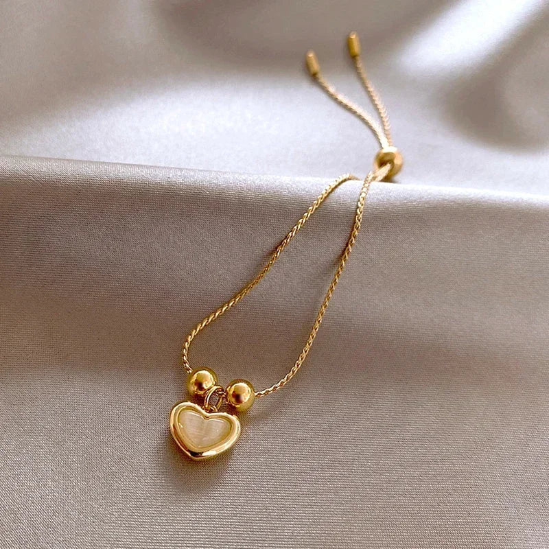 Hartvormige Armband van Perzikopaal Gecoat met Goud