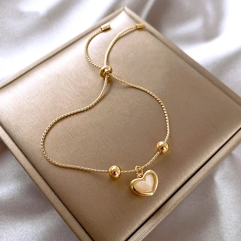 Hartvormige Armband van Perzikopaal Gecoat met Goud