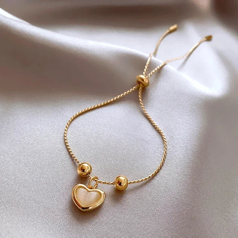 Hartvormige Armband van Perzikopaal Gecoat met Goud